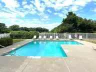 112 Oakleaf Drive 1003-A, Pine Knoll Shores, NC 28512 — 2-bedroom waterfront condo in Shutters OS, Pine Knoll Shores, NC, photo 4 of 58: Shutter on the Sound Pool