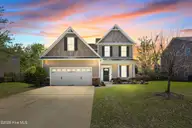 668 Heartwood Drive, Leland, NC 28479 — 4-bedroom home in Mallory Creek Plantation, Leland, NC, photo 1 of 63: Front of house