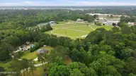 424 Camelia Drive, Washington, NC 27889 — 3-bedroom home in Macswoods, Washington, NC, photo 5 of 43: 7-web-or-mls-DJI_20260511145328_0091_D