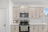 1080 Ben Thomas Drive NE, Leland, NC 28451 — 4-bedroom home in Coastal Haven, Leland, NC, photo 13 of 45: Kitchen (83)
