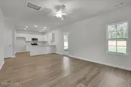 466 Galloping Foal Way SE, Bolivia, NC 28422 — 4-bedroom home in River Tide Farms, Bolivia, NC, photo 7 of 27: Family Room/ Kitchen