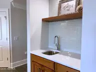 4425 Arendell Street 304, Morehead City, NC 28557 — 3-bedroom waterfront condo in HarborSide Club at 70W, Morehead City, NC, photo 18 of 42: Wet Bar