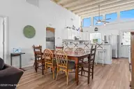 347 E First Street, Ocean Isle Beach, NC 28469 — 4-bedroom waterfront home, Ocean Isle Beach, NC, photo 9 of 49: Dining and Kitchen