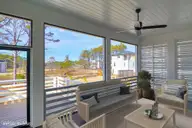 535 Sheldrake Court, Beaufort, NC 28516 — 4-bedroom home in Beau Coast, Beaufort, NC, photo 5 of 53: Screened Porch Overlooking Water