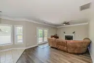 673 Morris Landing Road, Holly Ridge, NC 28445 — 3-bedroom home in The Preserve At Morris Landing, Holly Ridge, NC, photo 11 of 76: Living room