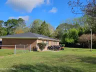 109 Weldon Drive, Dudley, NC 28333 — 3-bedroom home in Southern Plaza, Dudley, NC, photo 2 of 2: Back Yard View of Home