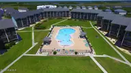918 N New River Drive 333, Surf City, NC 28445 — 2-bedroom waterfront condo in Surf Condominiums, Surf City, NC, photo 6 of 38: pool- ariel