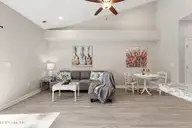 155 Lincoln Place Circle, Leland, NC 28451 — 3-bedroom townhome in Lincoln Place Townhomes, Leland, NC, photo 10 of 39: Living room - Vaulted Ceiling