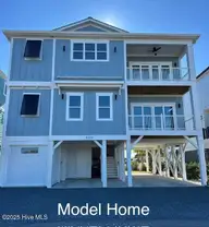 938 Ocean Boulevard W, Holden Beach, NC 28462 — 4-bedroom waterfront home, Holden Beach, NC, photo 1 of 7: Model Home