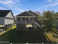 317 NE 60th Street, Oak Island, NC 28465 — 3-bedroom home in Tranquil Harbor, Oak Island, NC, photo 6 of 54: 7-web-or-mls-DJI_20261001091608_0604_D_e