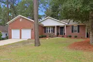 2405 Longleaf Drive W, Pinehurst, NC 28374 — 3-bedroom home in Village Acres, Pinehurst, NC, photo 1 of 41: front of home