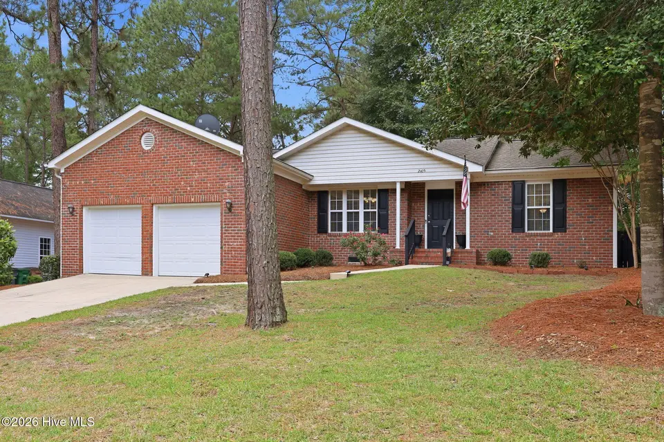 2405 Longleaf Drive W, Pinehurst, NC 28374 — 3-bedroom home in Village Acres, Pinehurst, NC, photo 1 of 41: front of home