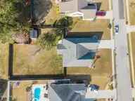 107 Cormorant Drive, Swansboro, NC 28584 — 4-bedroom home in Halls Creek North, Swansboro, NC, photo 10 of 52: 8-web-or-mls-DJI_20260318100638_0839_D
