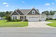 707 E Chatman Drive NW, Calabash, NC 28467 — 4-bedroom home in Spring Mill, Calabash, NC, photo 1 of 75