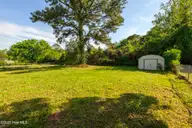 107 Tower Drive, Jacksonville, NC 28546 — 3-bedroom home in Regalwoods, Jacksonville, NC, photo 4 of 37: Fenced Backyard
