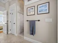 6414 Ocean Drive, Emerald Isle, NC 28594 — 5-bedroom waterfront home in Sea Crest, Emerald Isle, NC, photo 22 of 56: Master bathroom with tile walk in s