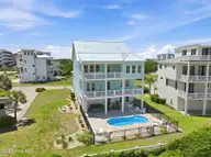 109 Ocean Bluff Drive, Indian Beach, NC 28512 — 6-bedroom waterfront home in Ocean Bluff, Indian Beach, NC, photo 5 of 57: Rear Elevation