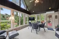 908 Sawgrass Court, New Bern, NC 28560 — 3-bedroom waterfront home in Fairfield Harbour, New Bern, NC, photo 10 of 51: Sunroom