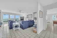 6605 Ocean Drive, Emerald Isle, NC 28594 — 5-bedroom waterfront home, Emerald Isle, NC, photo 24 of 70: living room with panoramic views