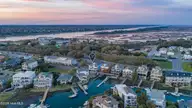304 Causeway Drive Unit A, Wrightsville Beach, NC 28480 — 3-bedroom waterfront condo in Windswept, Wrightsville Beach, NC, photo 7 of 52: 007_dji_20260319193022_0801_d_copy_725