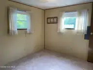 133 Myrtle Avenue, Kure Beach, NC 28449 — 3-bedroom manufactured home in Hanby Beach, Kure Beach, NC, photo 24 of 27: Pic-3