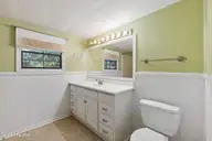 630 Dogwood Drive, Sunset Beach, NC 28468 — 3-bedroom manufactured home in Seaside Station, Sunset Beach, NC, photo 17 of 36: Primary Bath