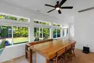 320 Summerhouse Drive, Holly Ridge, NC 28445 — 5-bedroom waterfront home in Summerhouse On Everett Bay, Holly Ridge, NC, photo 16 of 41: sunroom 2