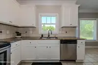 673 Morris Landing Road, Holly Ridge, NC 28445 — 3-bedroom home in The Preserve At Morris Landing, Holly Ridge, NC, photo 16 of 76: Kitchen