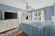121 NE 6th Street, Oak Island, NC 28465 — 3-bedroom home in Tranquil Harbor, Oak Island, NC, photo 10 of 21: 23_121_NE_6th_St-Bedroom-GE79