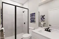 217 Brookwood Park Court, Sunset Beach, NC 28468 — 3-bedroom home in Sea Trail Plantation, Sunset Beach, NC, photo 7 of 10: First Floor Bath
