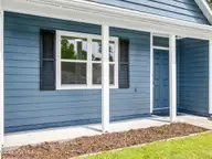 625 S Hampton Drive, Jacksonville, NC 28546 — 3-bedroom home in Cottage Cove, Jacksonville, NC, photo 4 of 50: Porch for Rockers