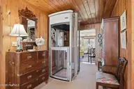 205 Club Colony Drive, Atlantic Beach, NC 28512 — 5-bedroom waterfront home in Club Colony, Atlantic Beach, NC, photo 20 of 38: Stiltz Home Elevator