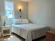 1103 Ocean Drive E & W, Emerald Isle, NC 28594 — 6-bedroom waterfront home, Emerald Isle, NC, photo 18 of 65: primary bedroom