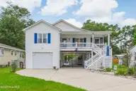1803 W Yacht Drive, Oak Island, NC 28465 — 3-bedroom home in Pinners Point, Oak Island, NC, photo 2 of 39: Front Elevation