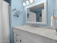 9201 Coast Guard Road C101, Emerald Isle, NC 28594 — 3-bedroom waterfront condo in Pebble Beach, Emerald Isle, NC, photo 19 of 41: Primary Bath