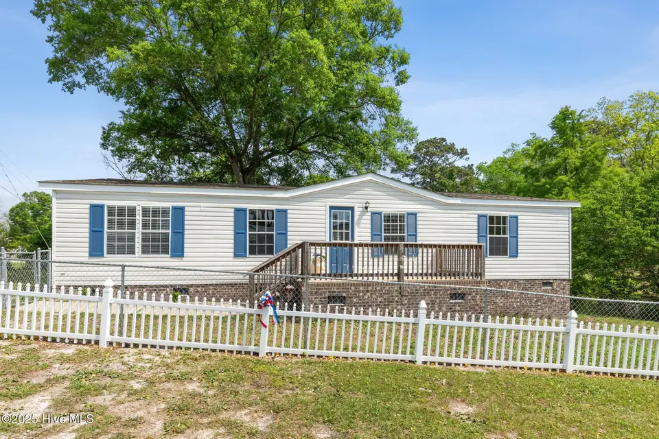 2807 Cross Bones Road SW, Supply, NC 28462 — 3-bedroom waterfront manufactured home in Buccaneer Hills, Supply, NC, photo 1 of 31: Front View