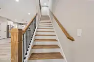 284 Longleaf Drive, West End, NC 27376 — 5-bedroom home in Seven Lakes West, West End, NC, photo 5 of 39: Stairs