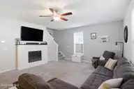 4164 Pegasus Parkway, Leland, NC 28451 — 3-bedroom home in Northern Lights, Leland, NC, photo 6 of 48: custom fireplace and mantle