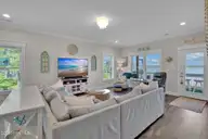 7202 E Yacht Drive, Oak Island, NC 28465 — 3-bedroom waterfront home in Tranquil Harbor, Oak Island, NC, photo 19 of 61: 7202 E Yacht Dr-11