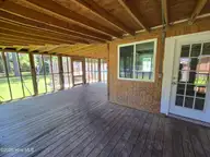 1018 Karen Drive, New Bern, NC 28562 — 3-bedroom home in Kingswood Villas, New Bern, NC, photo 12 of 24: 1018 Karen screened in porch 2