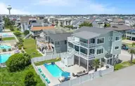 100 E Second Street, Ocean Isle Beach, NC 28469 — 4-bedroom waterfront home, Ocean Isle Beach, NC, photo 1 of 52