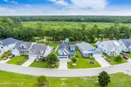 135 Spicer Lake Drive, Holly Ridge, NC 28445 — 4-bedroom waterfront home in Summerhouse On Everett Bay, Holly Ridge, NC, photo 2 of 75: 135 Spicer Lake Dr, Holly Ridge, NC