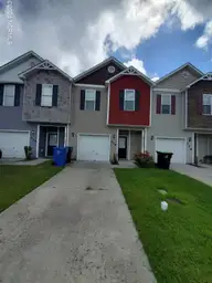 326 Cedar Island Trail, Holly Ridge, NC 28445 — 3-bedroom townhome in The Landing At Folkstone, Holly Ridge, NC, photo 1 of 30: Front of Home