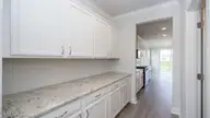 3216 Butterfly Ginger Street Lot 153, Leland, NC 28451 — 4-bedroom home in Indigo Preserve, Leland, NC, photo 9 of 36