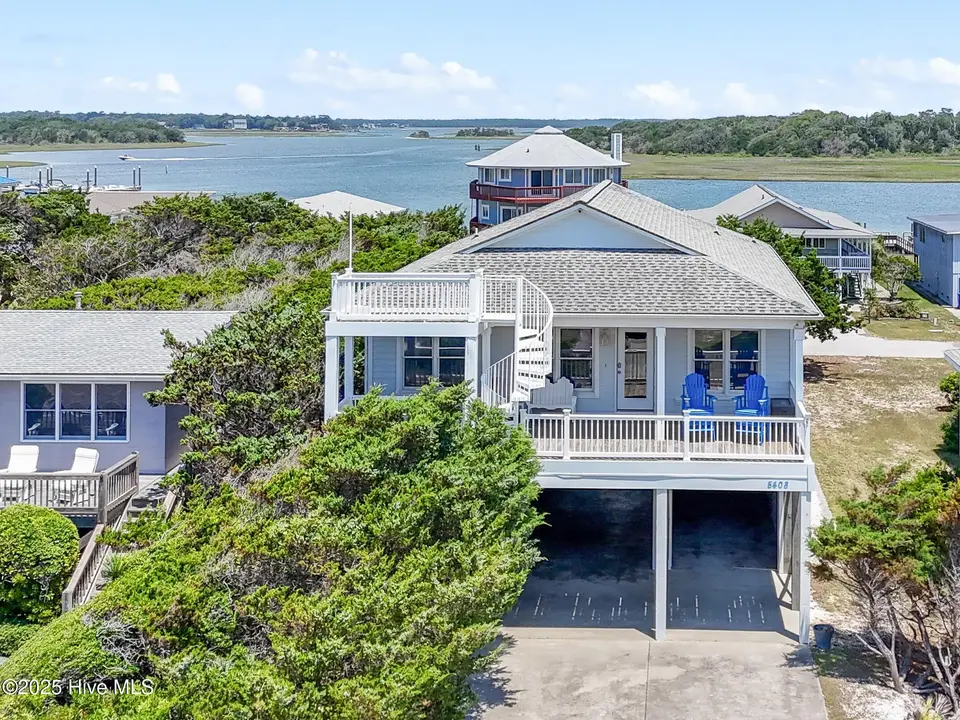 5408 W Beach Drive, Oak Island, NC 28465 — 4-bedroom waterfront home, Oak Island, NC, photo 1 of 47: 5408 W Beach Drive