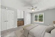 1122 Barkentine Drive, New Bern, NC 28560 — 3-bedroom waterfront home in Fairfield Harbour, New Bern, NC, photo 18 of 56: Primary Suite-virutally staged