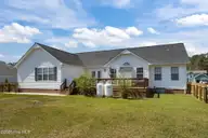 202 Nikida Court, Swansboro, NC 28584 — 3-bedroom home in River Reach, Swansboro, NC, photo 3 of 58: Rear View
