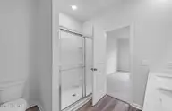 208 Ocean Pointe Boulevard SE 5301, Bolivia, NC 28422 — 4-bedroom home in Ocean Pointe, Bolivia, NC, photo 6 of 17: SC-CXT - IN- Owner's Walk-In Shower- Ibi