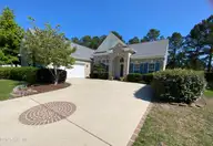 7473 Balmore Drive SW, Sunset Beach, NC 28468 — 4-bedroom home in Sandpiper Bay, Sunset Beach, NC, photo 2 of 62: 7473 Balmore Drive