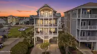 1401 Carolina Beach Avenue N, Carolina Beach, NC 28428 — 5-bedroom waterfront home, Carolina Beach, NC, photo 1 of 76: 1_1401_Carolina_Beach-twilight_004